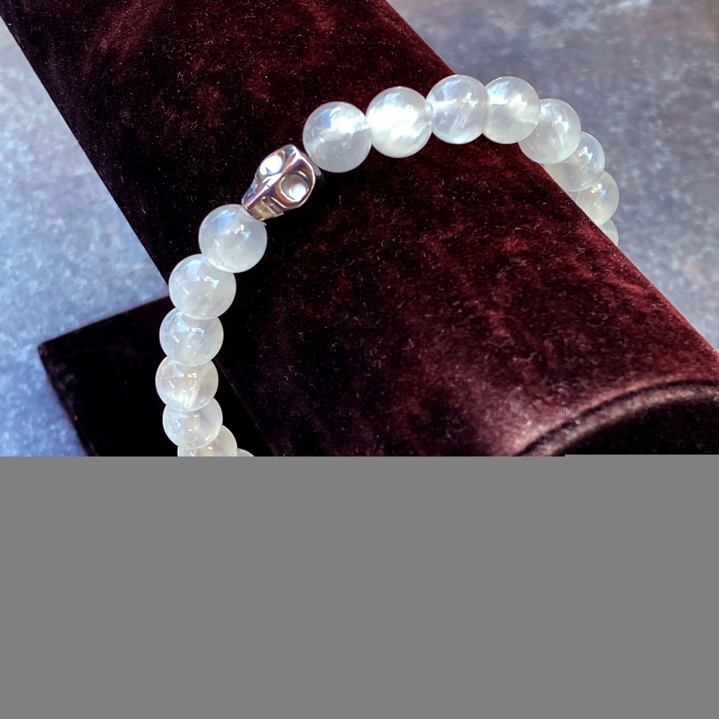 Selenite gemstone and Hematite Skull Men’s Stretch Bracelet