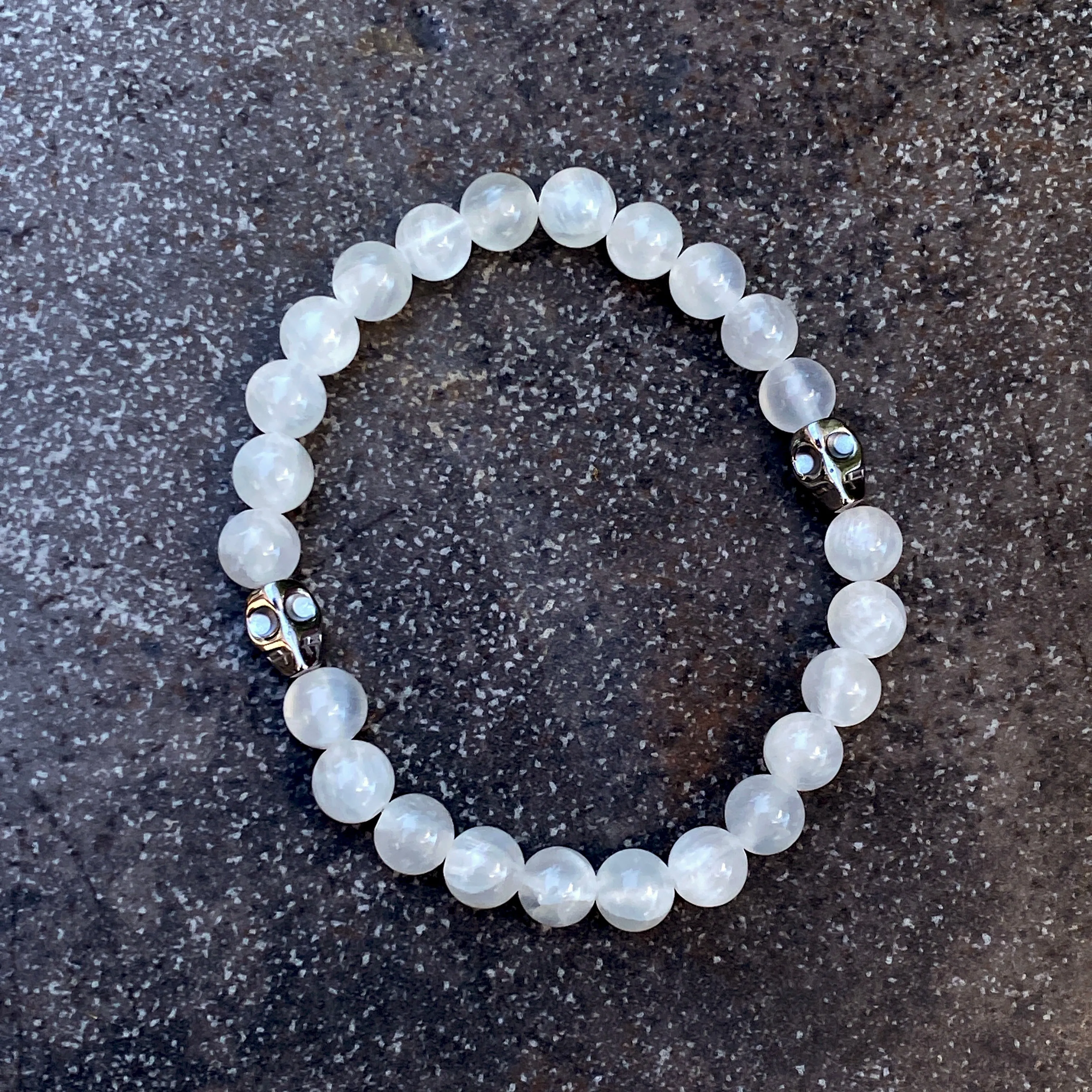 Selenite gemstone and Hematite Skull Men’s Stretch Bracelet